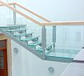 Стеклянные ступени и стеклянная площадка на лестнице в Новосибирске. Готовые проекты ПерилаГлавСнаб - фото 1